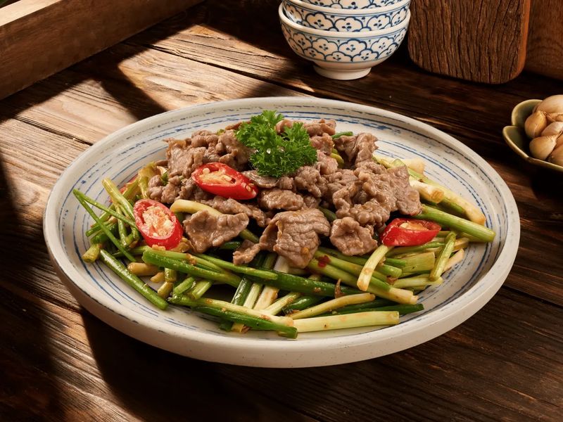 Bò Tươi Xào Ngồng Tỏi – Bò Tơ Quán Mộc
