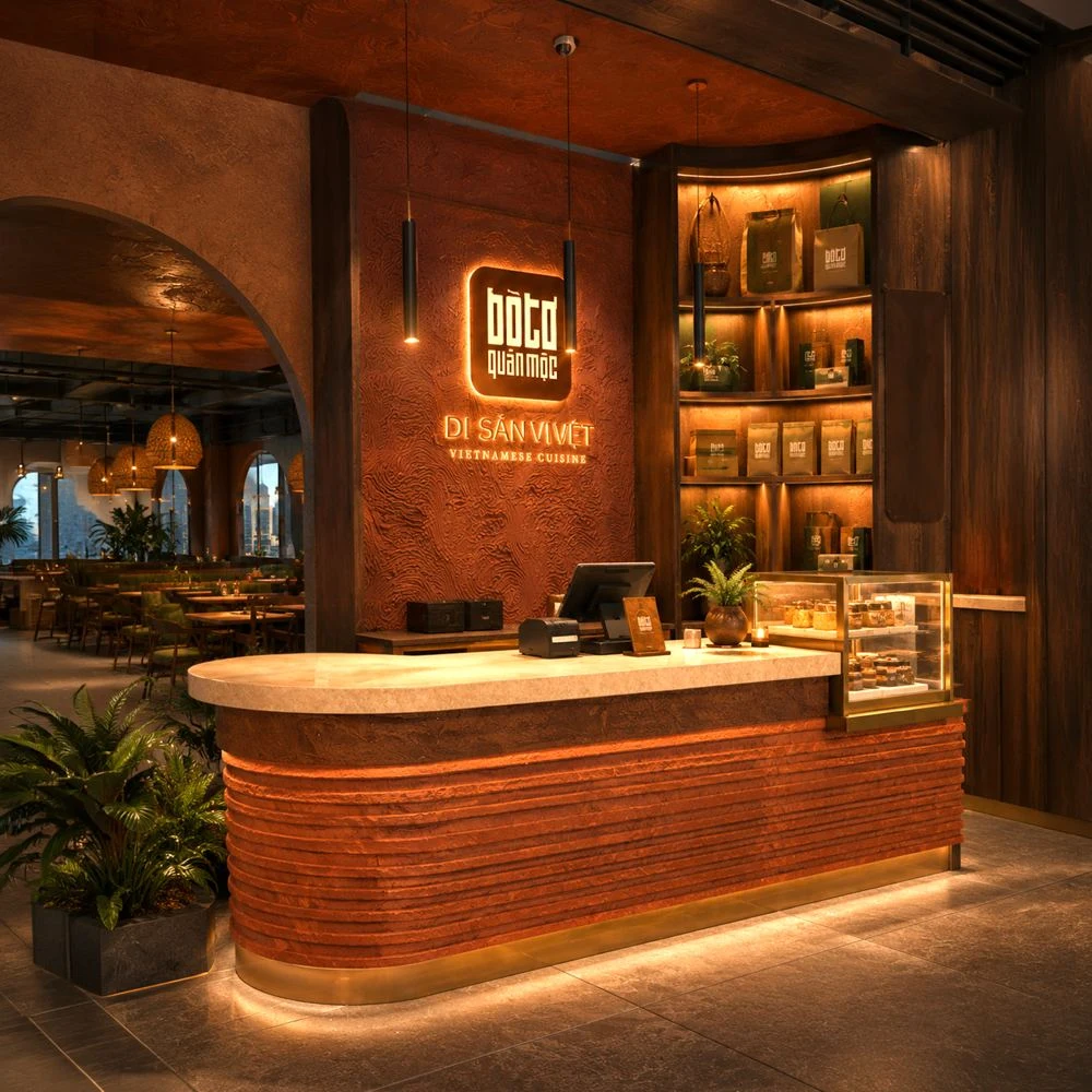 Quầy lễ tân với logo Bò Tơ Quán Mộc